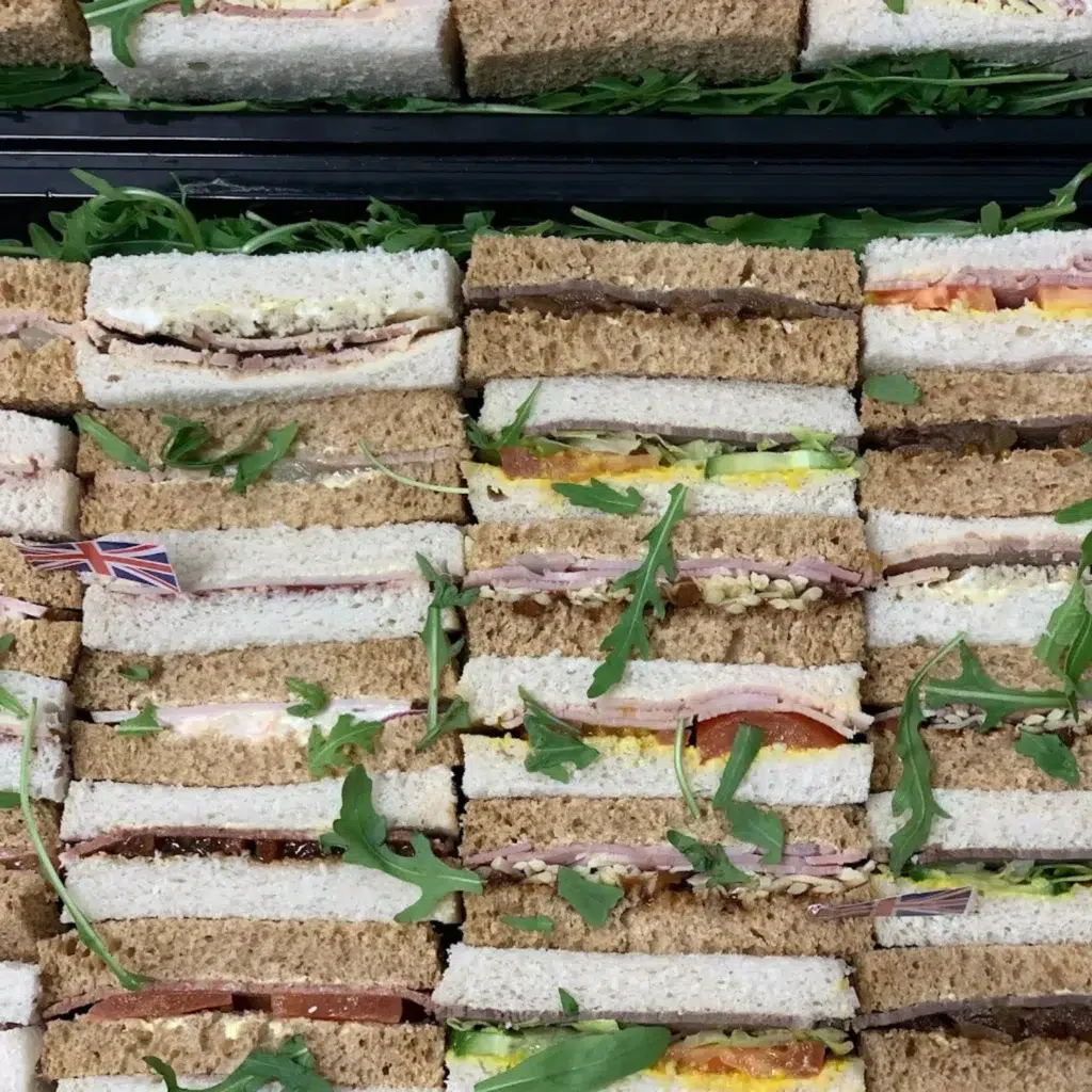 Homepage 9 Classic British finger sandwiches on white and wholemeal bread with premium fillings and Union Jack flags by Xpress Catering Bedfordshire