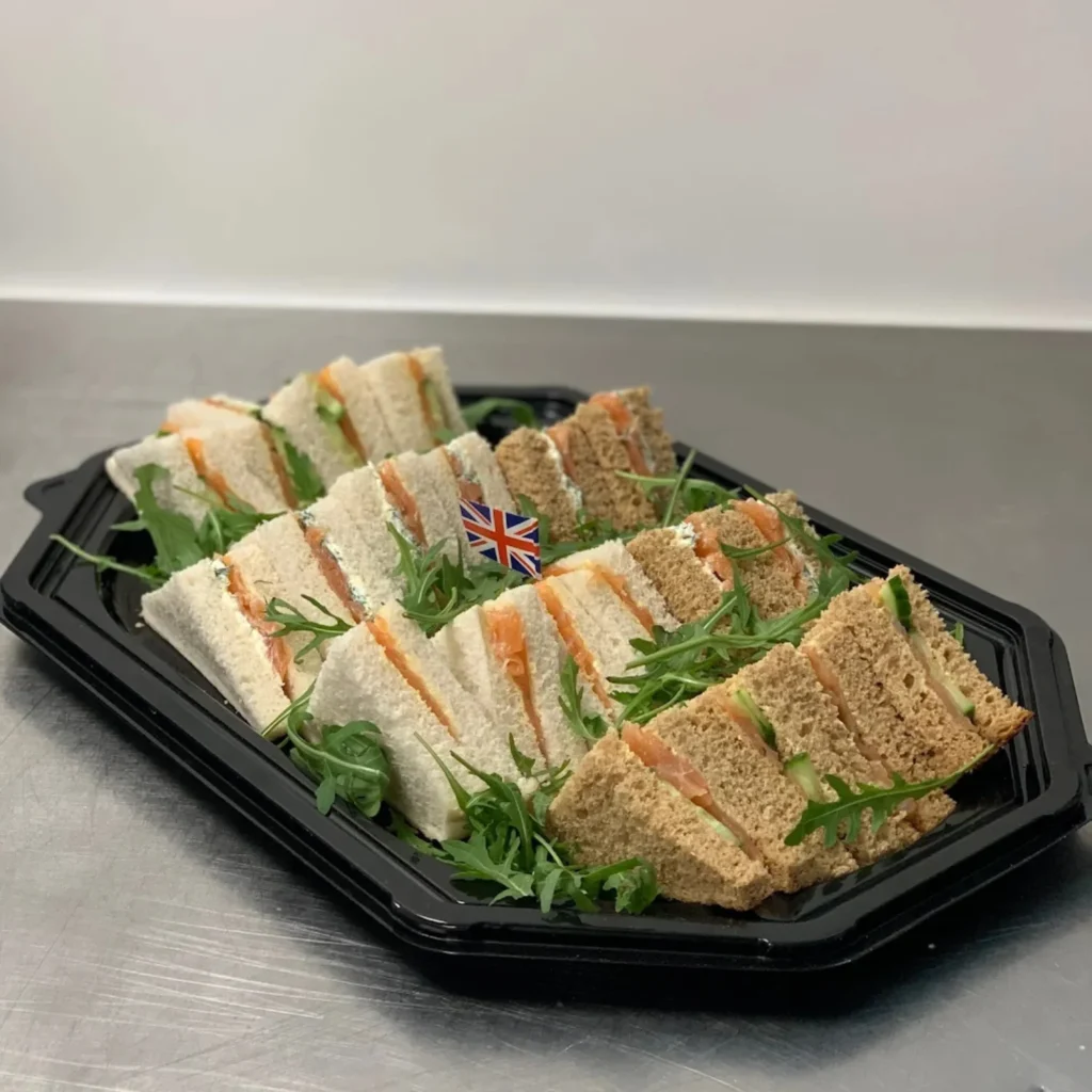 Homepage 5 Premium smoked salmon finger sandwiches on white and wholemeal bread with Union Jack flag decoration by Xpress Catering Bedfordshire