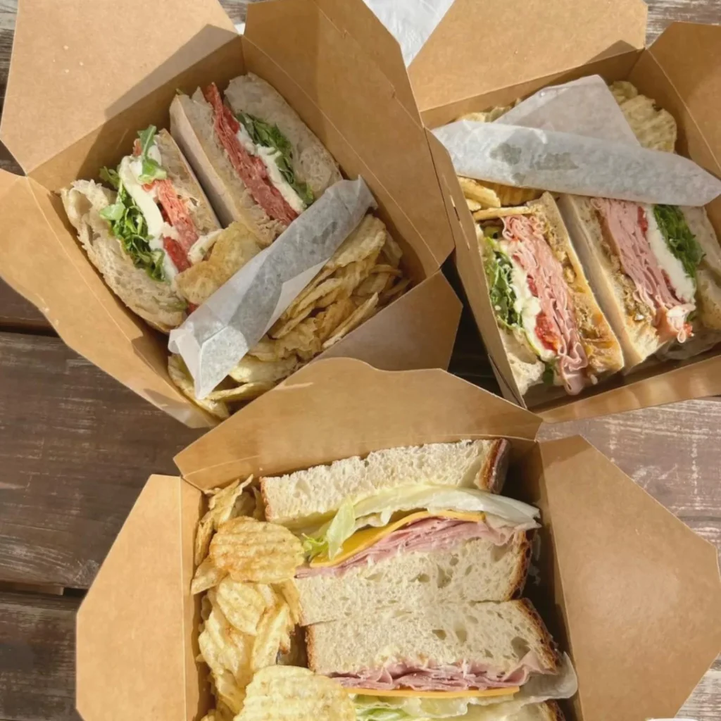 Food Delivery Service 6 Fresh handmade chicken panini sandwich with melted cheese, pesto and roasted vegetables prepared by Xpress Catering